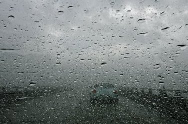 DAVID GRUNFELD / THE TIMES-PICAYUNE The Lake Pontchartrain Causeway was a slow go most of the day as rain and dense fog kept motorists from traveling the 24 mile bridge at normal speeds Monday December 14, 2009.